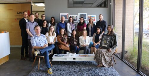 The Workhorse team posing in the office reception area in 2019.