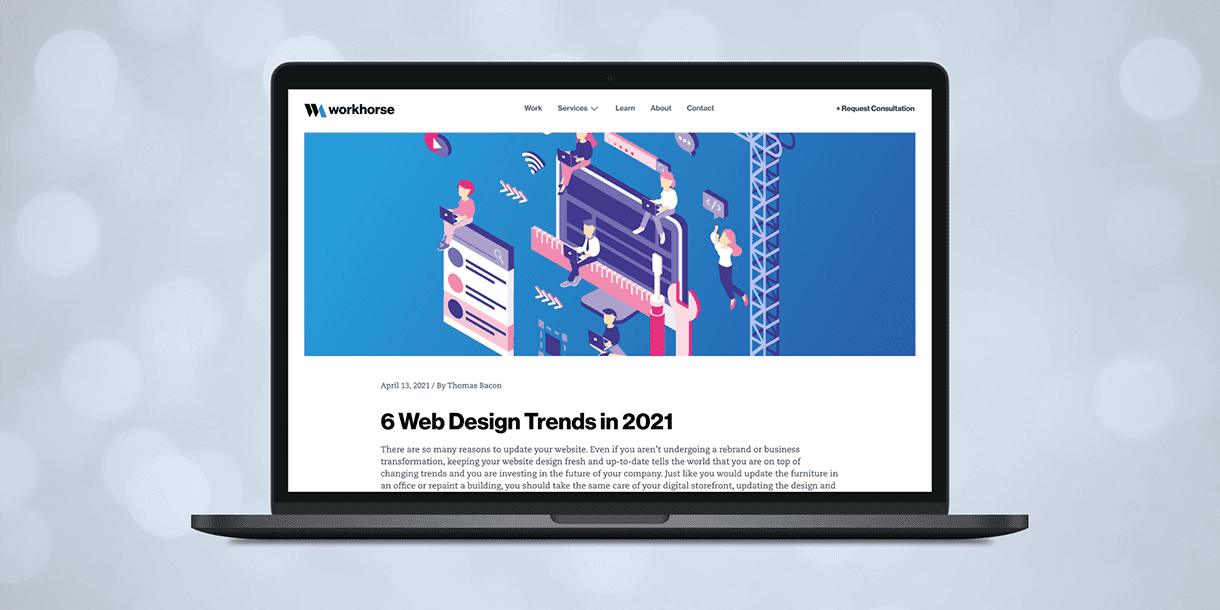 A blog post titled 6 Web Design Trends in 2021 displayed on a laptop computer screen.