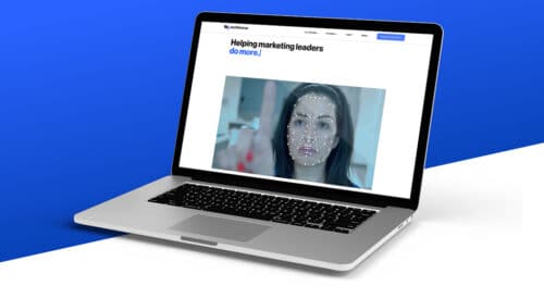 A laptop displaying the Workhorse Marketing website homepage.