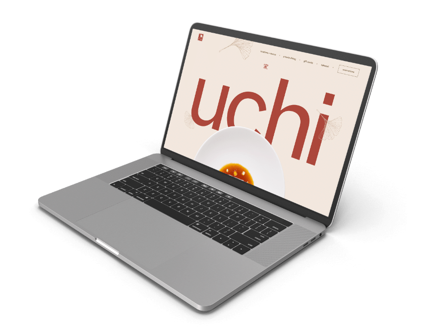 A laptop displaying the Uchi website homepage.